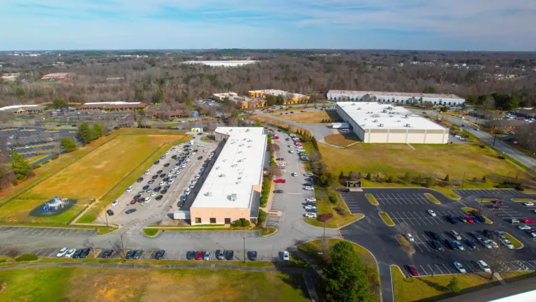 Aerial view of NHA Phoenix Academy's bustling drop-off line captured by a drone.